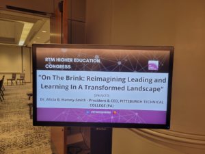 welcome sign reading "n the brink: reimaging leading and learning in a transformed landscape"