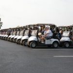golf carts lined up and ready to go