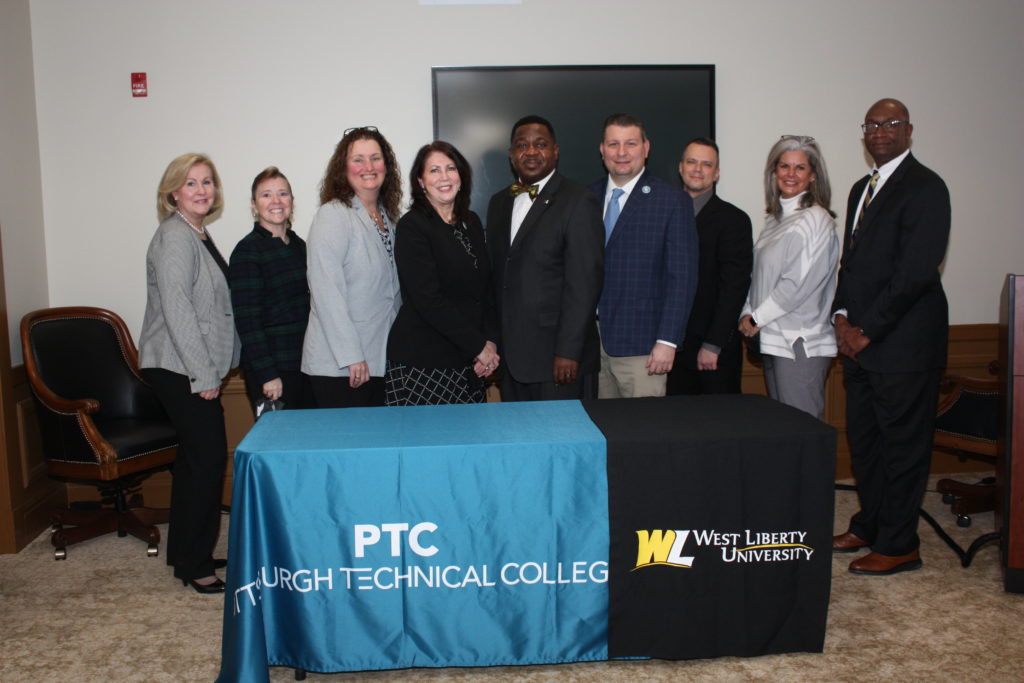 Representatives from PTC and West Liberty University at the signing