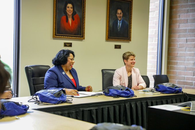 Dr. Harvey-Smith sitting with Superintendent Dr. Jerri Lynn Lippert.