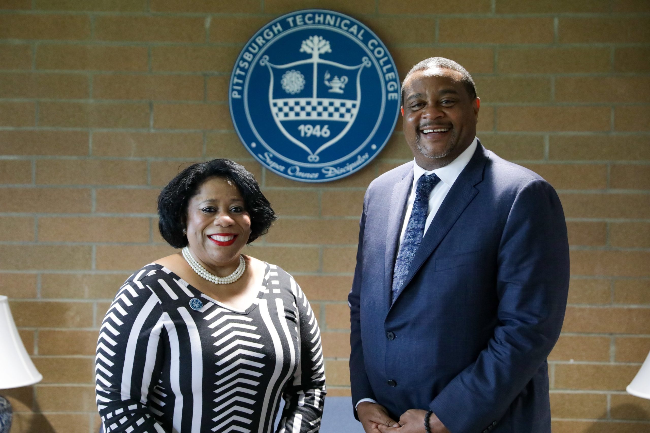 A photo of Dr. Harvey-Smith standing with Mayor of Pittsburgh Ed Gaines