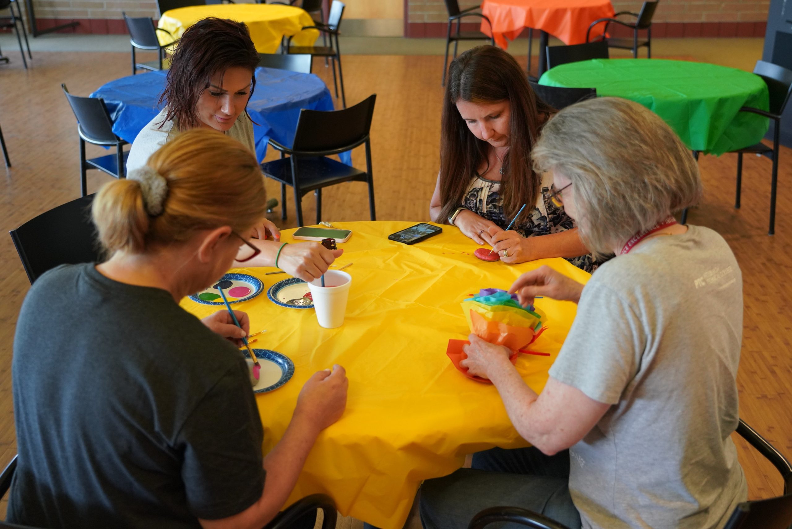 Faculty & Staff enjoying working on crafts for the crafternoon event.