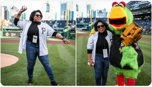 Dr. Harvey-Smith preparing to throw the first pitch at PNC Park and standing with the Pittsburgh Pirate's mascot.