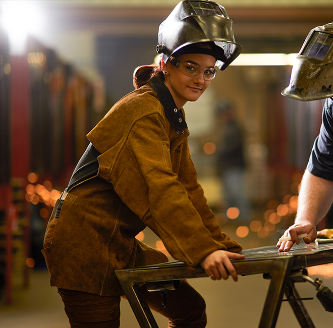 A photo of a student learning welding.