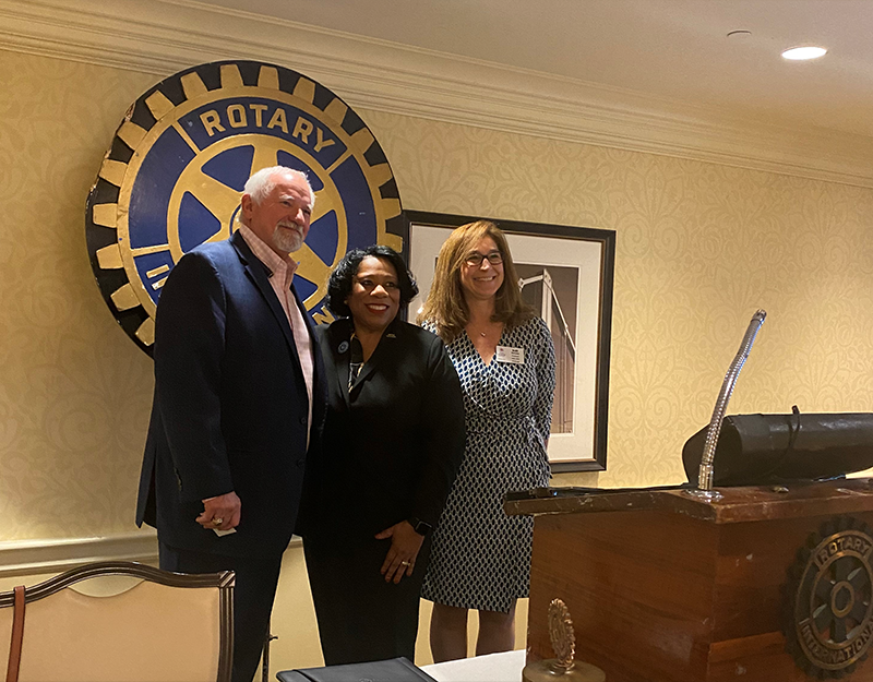 Dr. Alicia Harvey-Smith posing for a picture at the Rotary Club of Pittsburgh.
